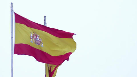 Amazing view on two waving Spanish flags, nationality and patriotism, freedom