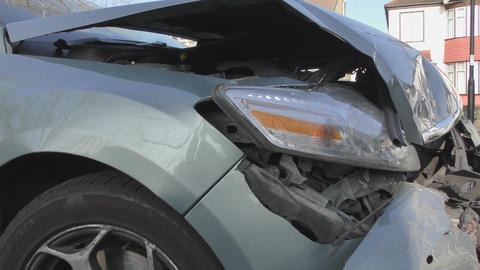 Broken in front of the car on the road