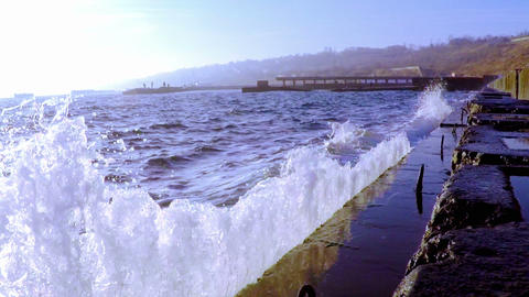 Waves Breaking on the Breakwater