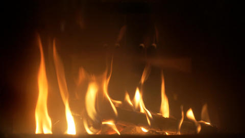 Burning wood in a fireplace