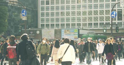 Crowds crossing Sachiko Exit in Shibuya, Tokyo