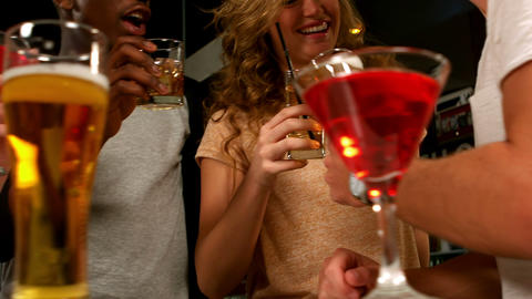 Cute friends having drinks