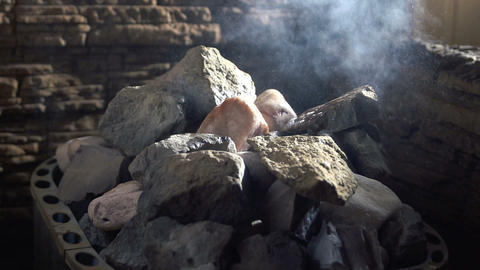 Water flowing on the stone in sauna. health concept. Slow motion