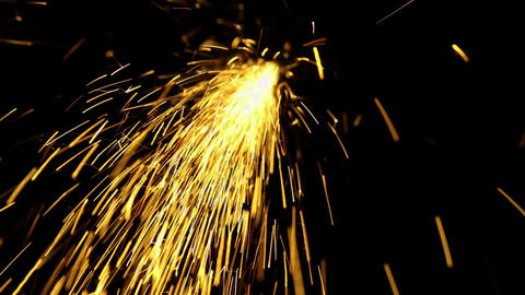 Welding sparks particles golden color