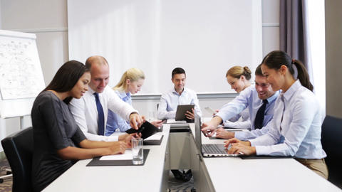 smiling business people meeting in office