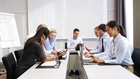 smiling business people meeting in office