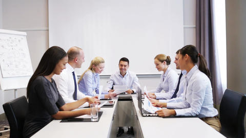 smiling business people meeting in office