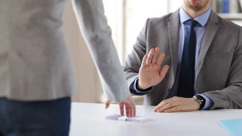 close up of businessman refusing from money bribe