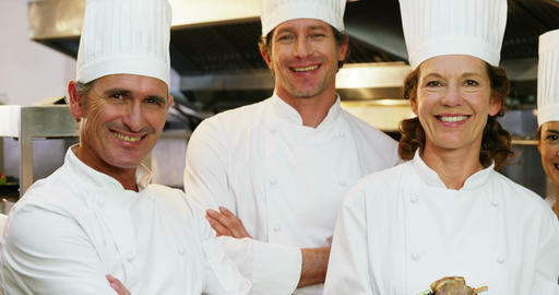 Cook gourmets posing together