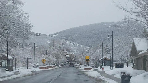 Driving Through Snowy Streets of Utah