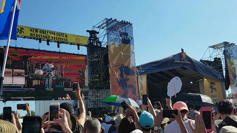New Orleans Jazz and Heritage Festival Band Playing with Crowd