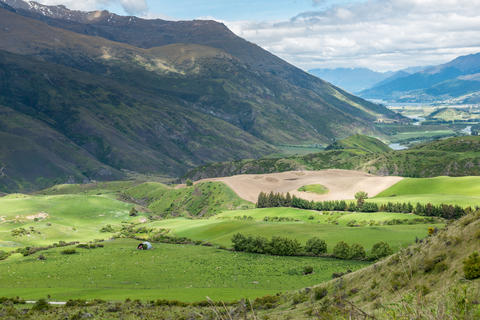 Sunny valley view from the Crown Range Road Scenic Lookout Point near Queenstown
