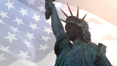 Double exposure with American flag waving and statue of liberty for Memorial Day or Independence Day