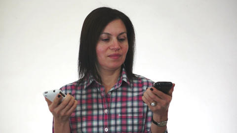 Woman With Two Cellulars