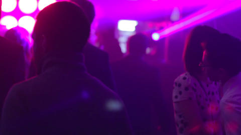 Dance floor full of club lights at night party