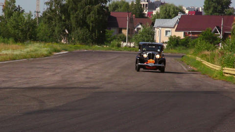 Vintage cars Rockne Six 75 Studebaker and Ford Model A on the road