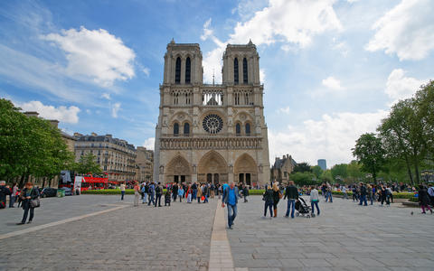 People at Notre Dame de Paris Cathedral Paris France