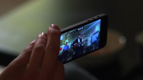 Recording video clip of performing band on telephone, new phone