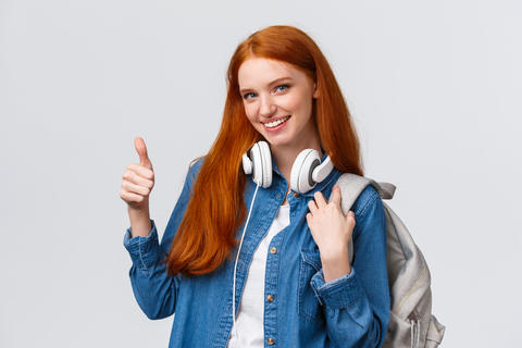 Girl found excellent part-time job after university classes. Attractive redhead