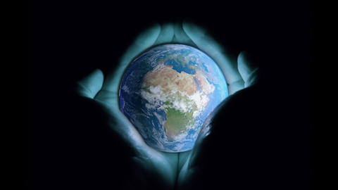 3d animation: Men's hands holding the rotating planet earth with a blue glow on a black background.