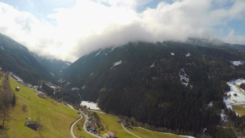 Amazing view of majestic mountains, thick clouds, high humidity, weather change