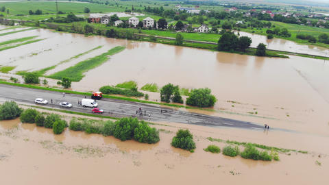 Flooded highway. Flooded road during floods. Cars that can not pass on the road