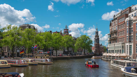 Amsterdam cityscape skyline with landmark building and canal in Netherlands
