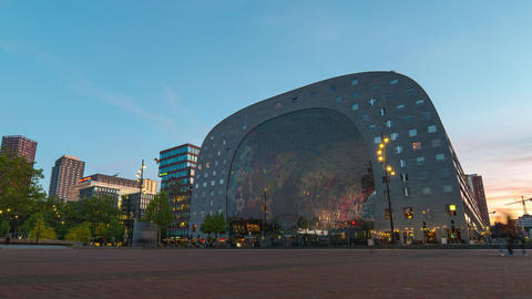 Markthal with Rotterdam skyline at night in Netherlands