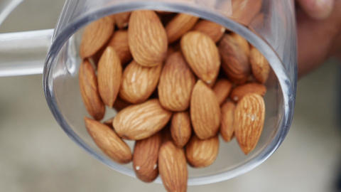 Nut almond close up. product rich in minerals and vitamins. Almond turns in a shot