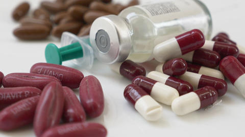 Close up of the rotation different pills or capsules
