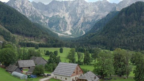 Aerial view of Alpine Valley with rustic farm in front