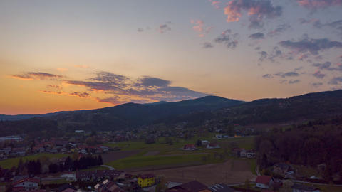 Sunset hyperlapse above suburban neighbourhood