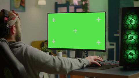 Gamer playing video games on powerful computer with gree GIF 16403137 ...