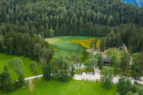 Turquoise Alpine lake, aerial view of Plansar lake in Zgornje Jezersko, Slovenia
