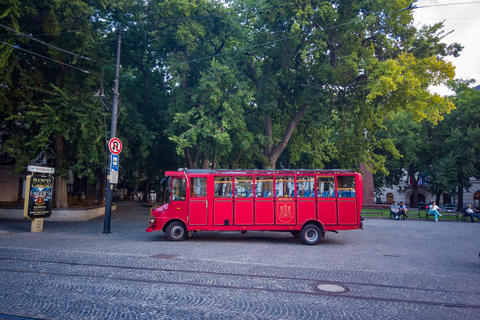 An antique red bus on the streets of Bratislava