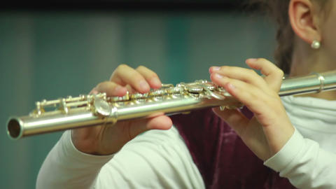 Hands play wind instrument 10