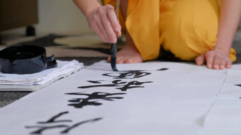 Japanese woman doing calligraphy