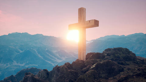 Cross on the mountain of Christian faith with sunrise of faith of Chris