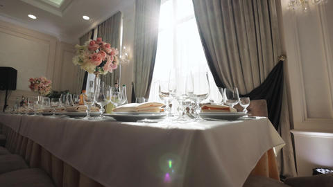 Luxury table settings for fine dining with and glassware, beautiful background
