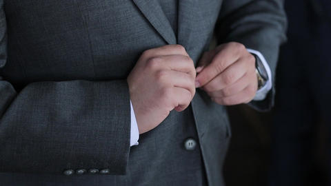 Businessman Dressing Up a Black Suit. Dressing groom and preparing for ceremony