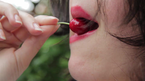 Young sensual girl with red lips playing with a cherry w GIF 18521915 ...