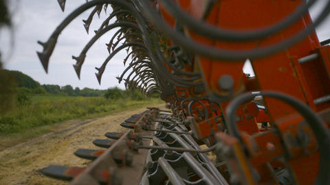 Harvesting in the field. Land cultivation with a tractor