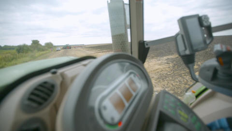 Harvesting in the field. Land cultivation with a tractor