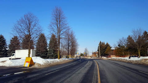 Driver Point of View Driving Into Covid Testing Facility in Winter