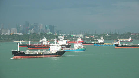 Merchant ships at the Port of Singapore. Cargo ship at industrial import-export