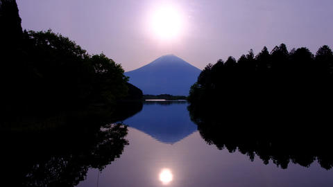 Sunrise sun and Mt. Fuji from Lake Tanuki
