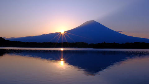 Sunrise sun and Mt. Fuji from Lake Tanuki