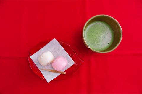 Matcha green tea, red and white manjuu, Japanese sweets and tea ceremony