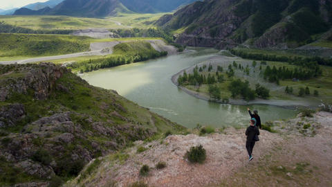 Epic drone flight over a mountainous Siberian river and mountains