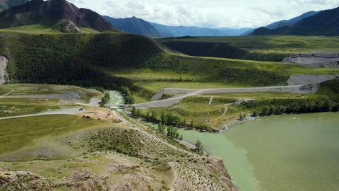Epic drone flight over a mountainous Siberian river and mountains